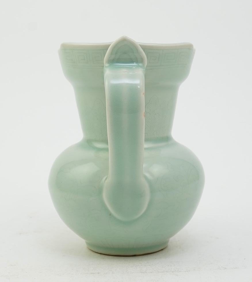 A Chinese incised celadon glazed monks cap ewer, Qianlong seal mark but later, 17cm